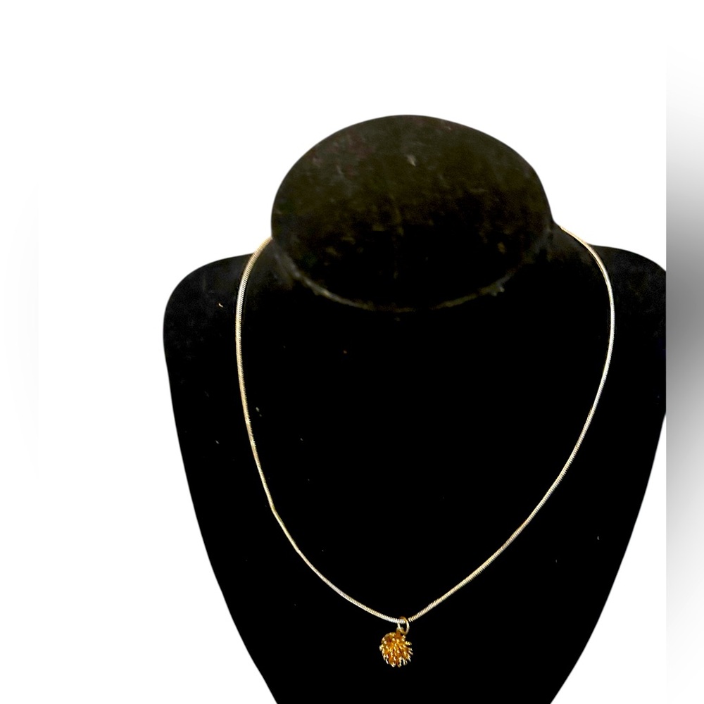 Necklace with Delicate spiky copper colored Pendant